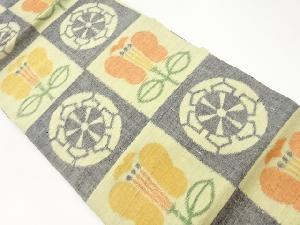 手織り紬抽象市松に源氏車・遠州椿模様織出し名古屋帯